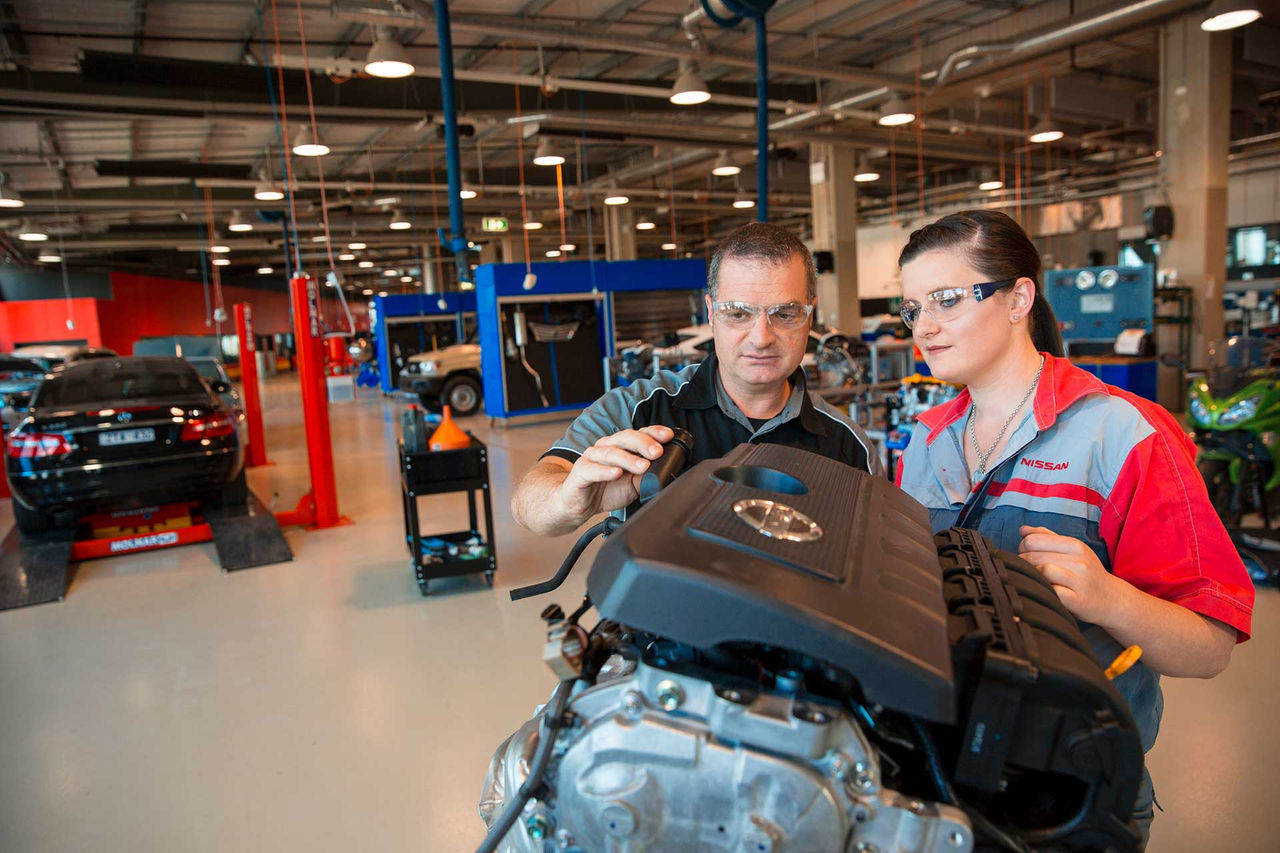Automotive teacher and student