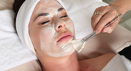 Female receiving facial treatment