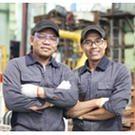 2 students in overalls and cap