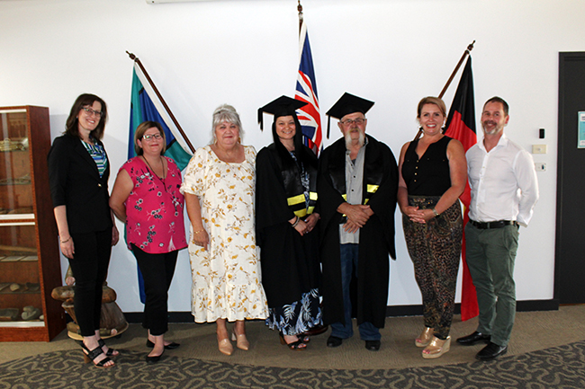 Sally with graduate and teachers