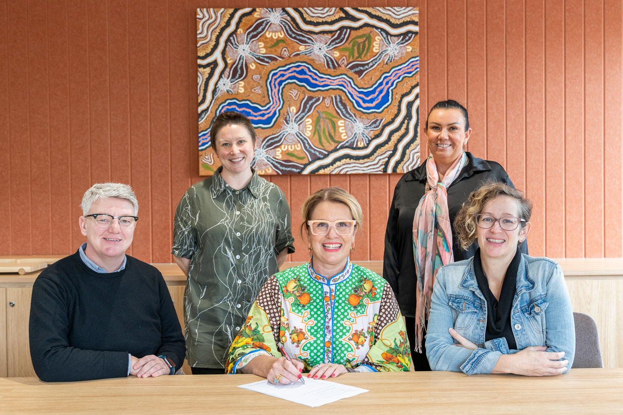 Kangan Institute and Women's Health in the North representatives formalising the agreement.