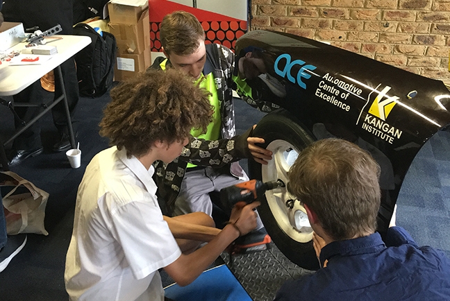 Secondary Students experiencing tyre changing