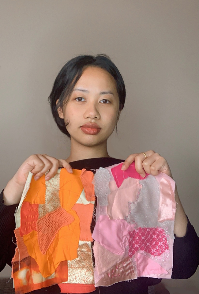 student holding fabric