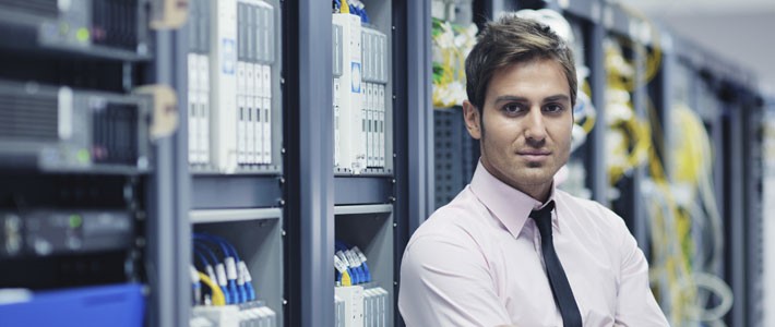 Professional man in server room