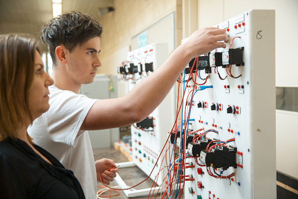 Male apprentice working