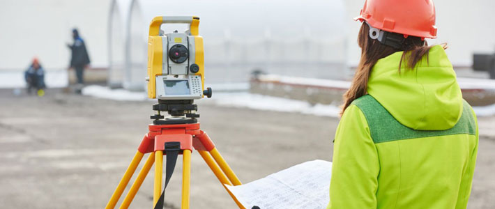 Worker checking site plans