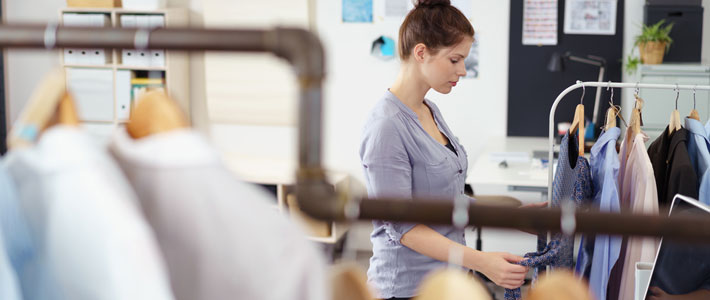 Woman in fashion retail setting