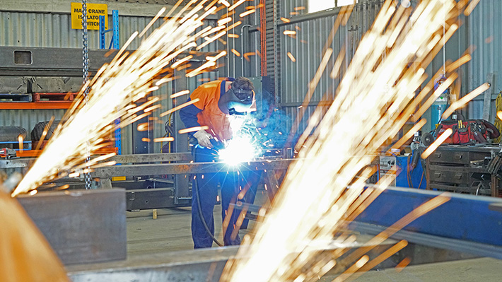 Welding in manufacturing workshop