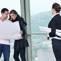 Male and female looking at project map