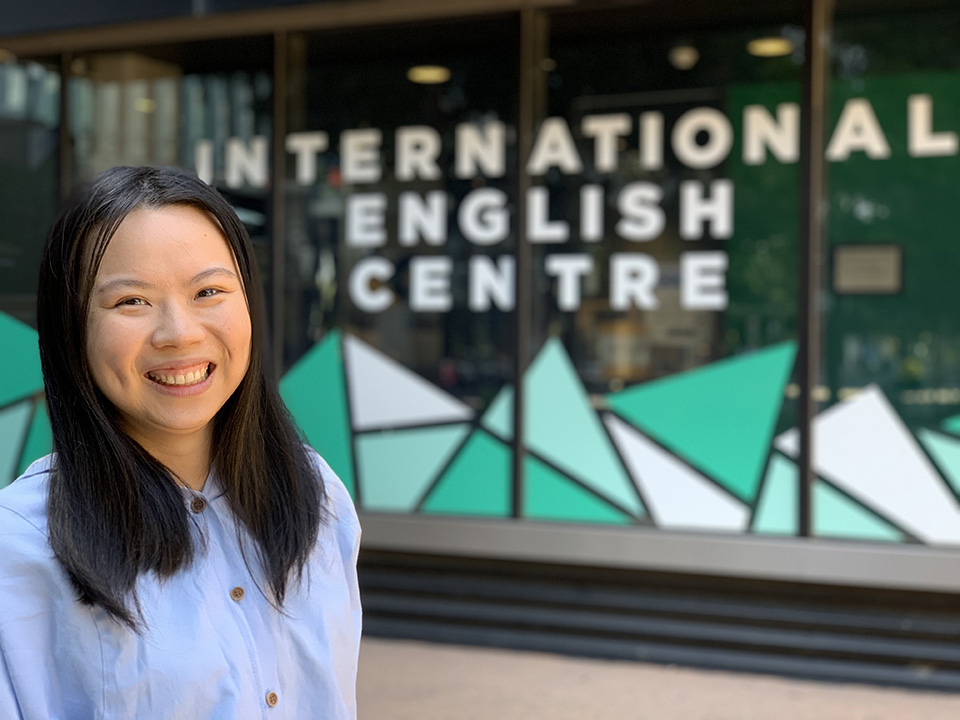 Jessie Lin standing outside TAFE smiling