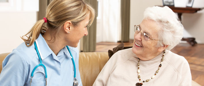 Aged care support worker helping  senior citizen 