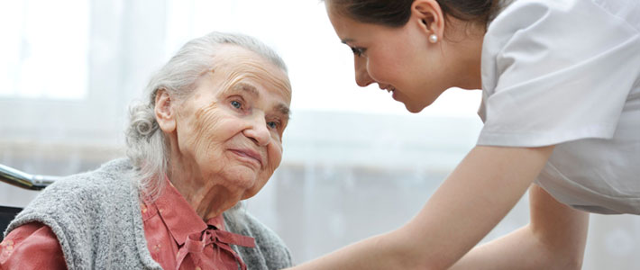 Nurse helping patient 